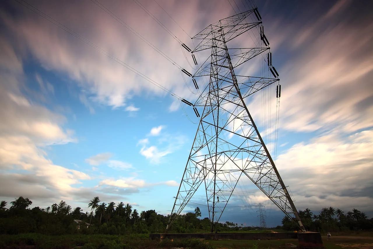 High-voltage power transmission tower under sky